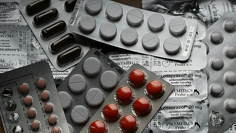 Blister packs of prescription pills symbolizing Pregabalin misuse concerns and stricter Schedule H1 drug regulation in India.