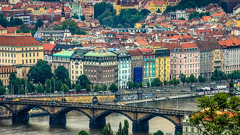 City of prague with canals and colourful buildings.