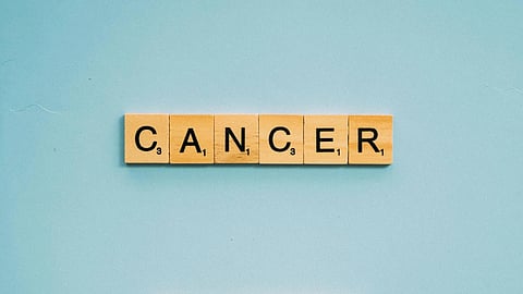 A collection of cancer zodiac signs displayed in various artistic styles and colors.