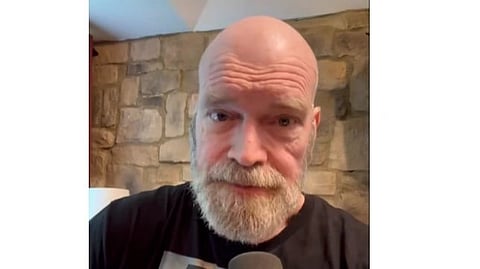 Tyler Mane in Black T-shirt.