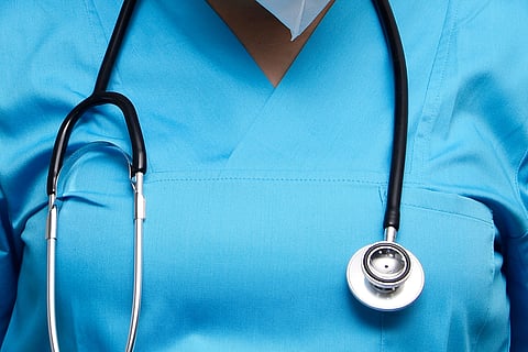Government doctor with stethoscope highlighting Bihar NOC policy for higher studies eligibility