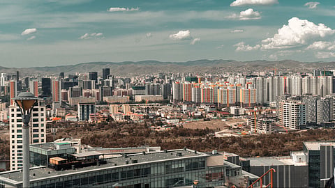 City in Mongolia with buildings and sky.