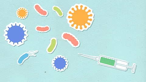 Cartoon depicting a syringe surrounded by various colorful germs.