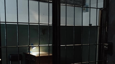 A prison with bars.