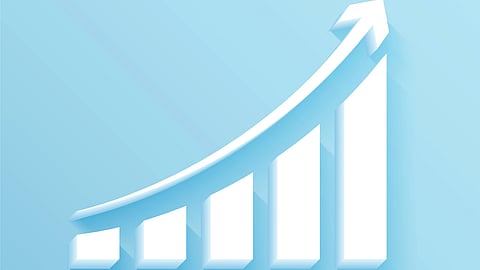 A simple white 3D bar graph on a light blue background with increasing bars and an upward arrow showing growth.