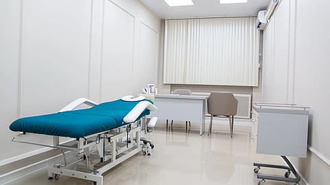 A clinic with a stretcher.