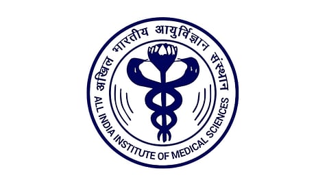 The AIIMS logo shows a blue caduceus with a lotus on top, surrounded by the institute’s name in English and Hindi.