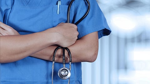 Doctor holding a stethoscope.