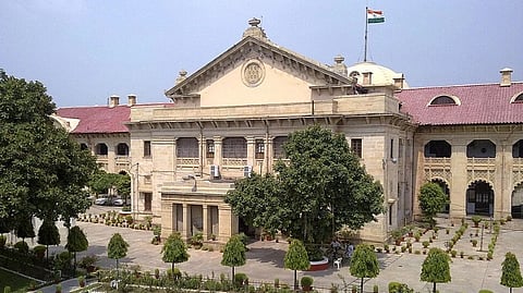 A dusty pink and beige building of the Allahabad HC.