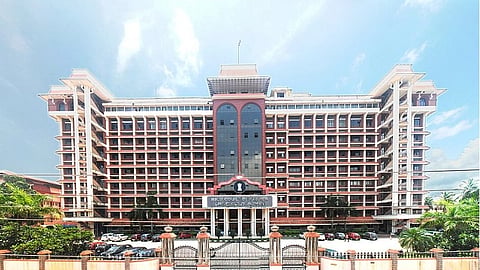 Kerala high court building and sky  behind.