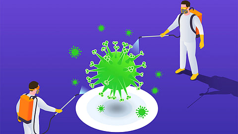 Workers in protective suits disinfect a large virus illustration.
