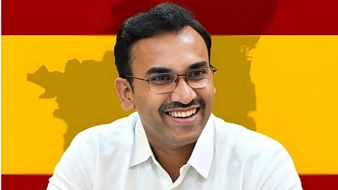 K.G. Arunraj in a white shirt.