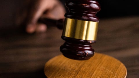 Court gavel representing the Delhi court's bail ruling in the NEET-UG paper leak case.