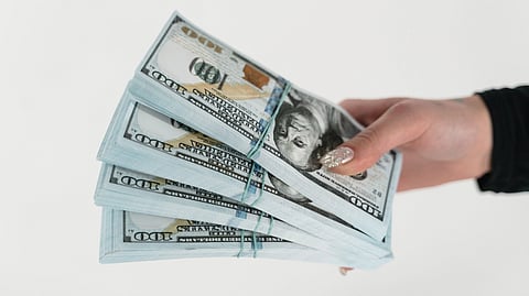 Dollars in hand.