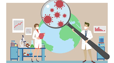 Two scientists in lab coats conduct disease research in a laboratory.