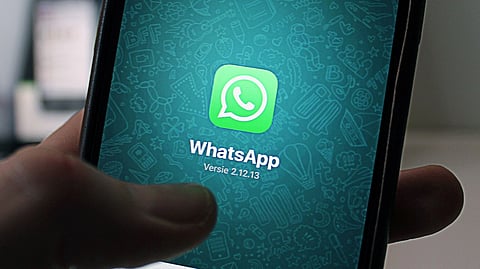 A whatsapp app on screen.