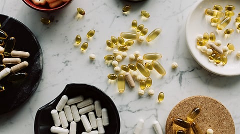 Transparent yellow colored peptide capsules.