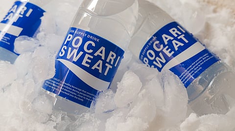 three bottles of electrolytes on ice