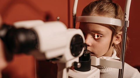 Girl getting her eye checked