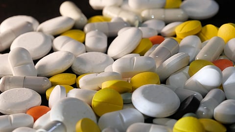 A close-up shot of various capsules and tablets, illustrating healthcare and medication concepts