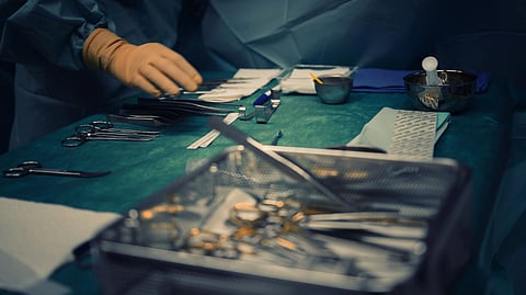 A table with surgical equipment.