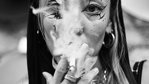 black and white picture of woman smoking