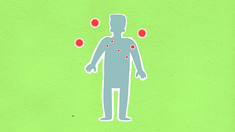 cutout of man surrounded with viruses