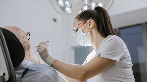 dentist doing an examination on patient