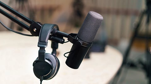 A podcast headset and a mic