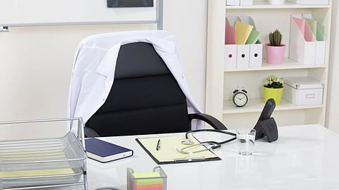 A clean and organized medical office featuring a stethoscope on a desk