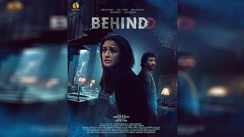 Behind movie poster