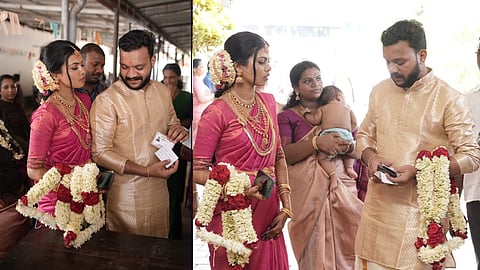 വോട്ട് രേഖപ്പെടുത്താൻ  തൃക്കാരിയുർ ഗവ എൽ.പി സ്കൂളിലെത്തിയ വധു -വരൻമാർ
