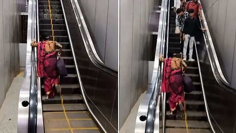 video of women casually attempts to climb downward moving escalator