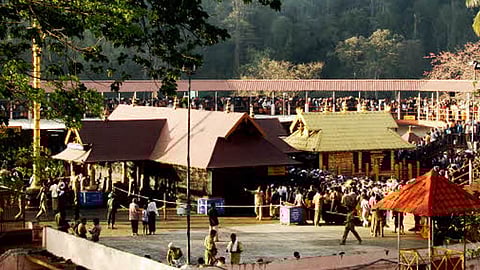 kerala hc bans coconut rolling turmeric powder scattering at sabarimala malikappuram