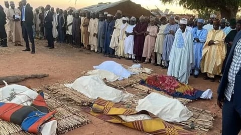 On Christmas Day, the family members of Howa, who were burned to death, are being buried in a mat.