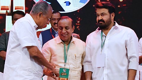 Ravi Pillai with Kerala Chief Minister Pinarayi Vijayan and actor Mohanlal