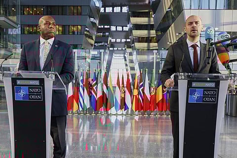 Britain's Foreign Secretary David Lammy, left, and French Foreign Minister Jean-Noel Barrot address the media during a meeting of NATO foreign ministers at NATO headquarters in Brussels, Friday, April 4, 2025.