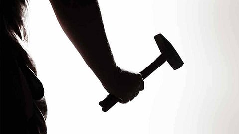 Young man with a hammer; then threats and obscenities