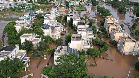 flood in china beijing 30 more deaths