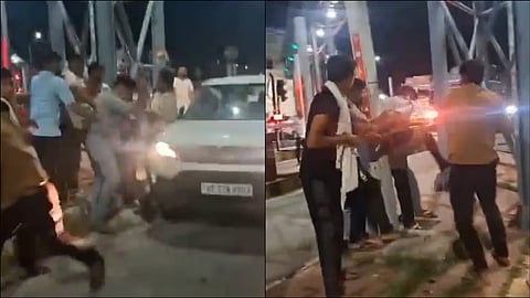 army official beaten and Pinned To Pole by toll booth staff