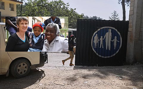 Jean Heratty and her colleague with a three-year-old child