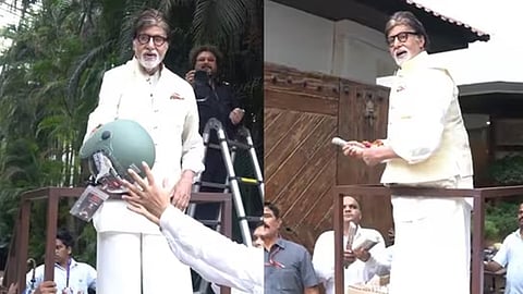 Amitabh Bachchan gives away free helmets to fans