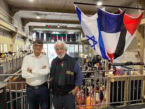 Edgar Laloum and Radjaa Aboudagga founders of the restaurant "Sababa, le goût de la paix" (Sababa, the Taste of Peace) pose for a picture during the opening of the restaurant in Paris on October 11, 2025.