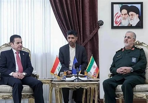 IRGC chief Mohammad Pakpour meets Iraqi National Security Adviser Qasim al‑Araji in Tehran, Oct. 21. 