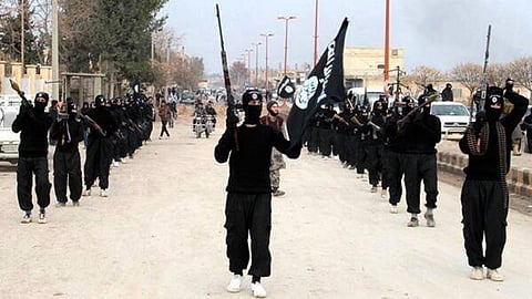 Islamic State militants parade in Tel Abyad, near Syria’s border with Turkey.