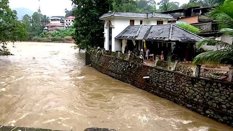 kerala water tank burst flood homes