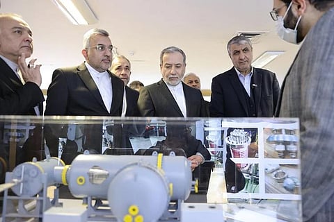  the Atomic Energy Organization of Iran, Foreign Minister Abbas Araghchi,   the head of the Atomic Energy Organization of Iran, Mohammad Eslami

