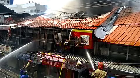 BROADWAY FIRE, 12 SHOP FIRE CATCHED