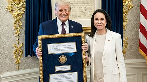 Venezuelan Nobel Peace Prize winner presents her medal to Trump