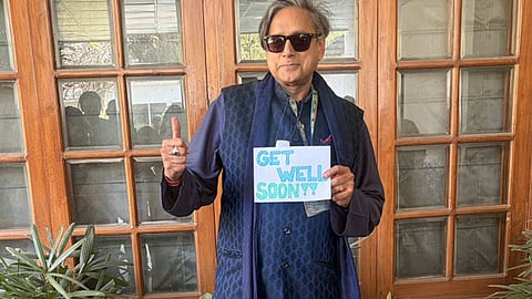 shashi tharoor leg fracture parliament wheelchair